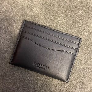 Coach black leather card case